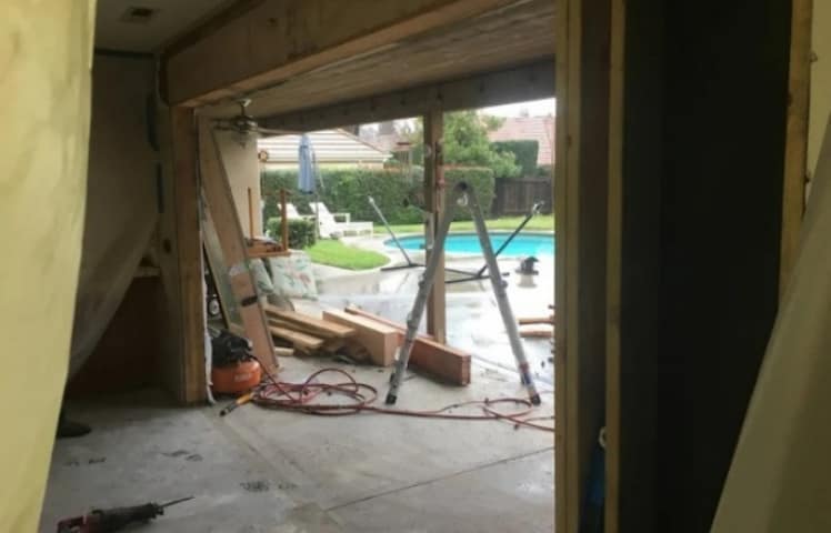Opening modification in progress for door installation project
