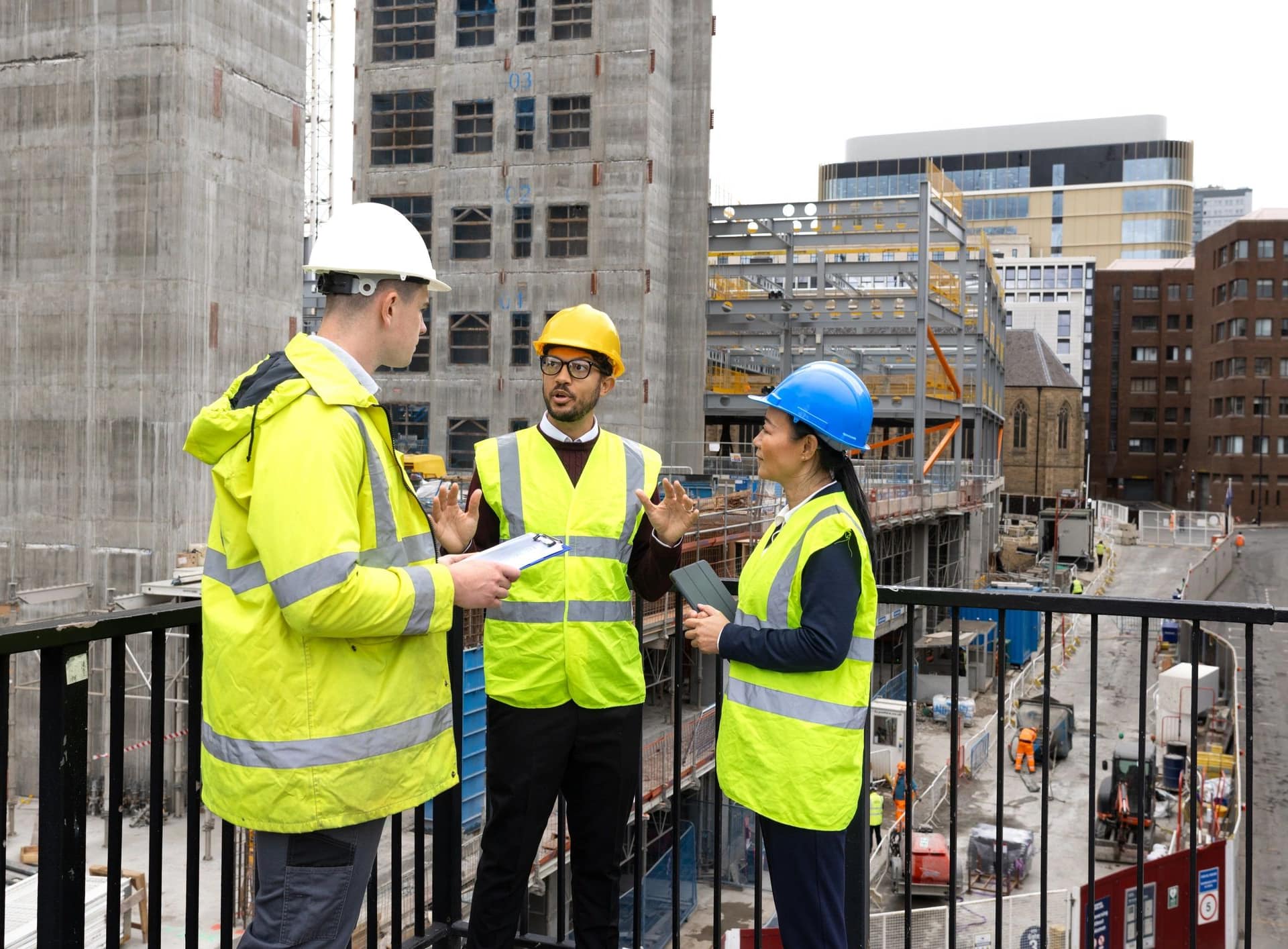 On Point Construction team reviewing plans at a job site
